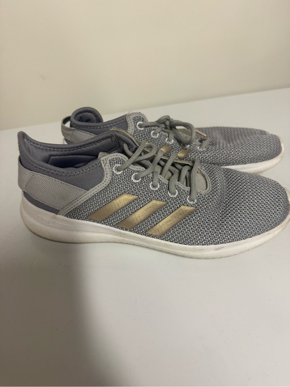 adidas Women’s Gray Knit Sneakers with Gold Stripes